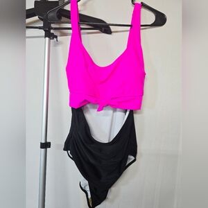 Chic Pink and Black One Piece Swimsuit with Stylish Cut-Out